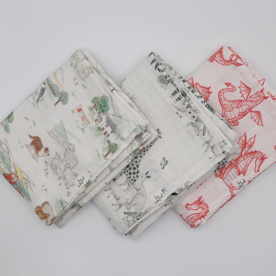 Set of four fabric swatches with animal prints on a light gray background