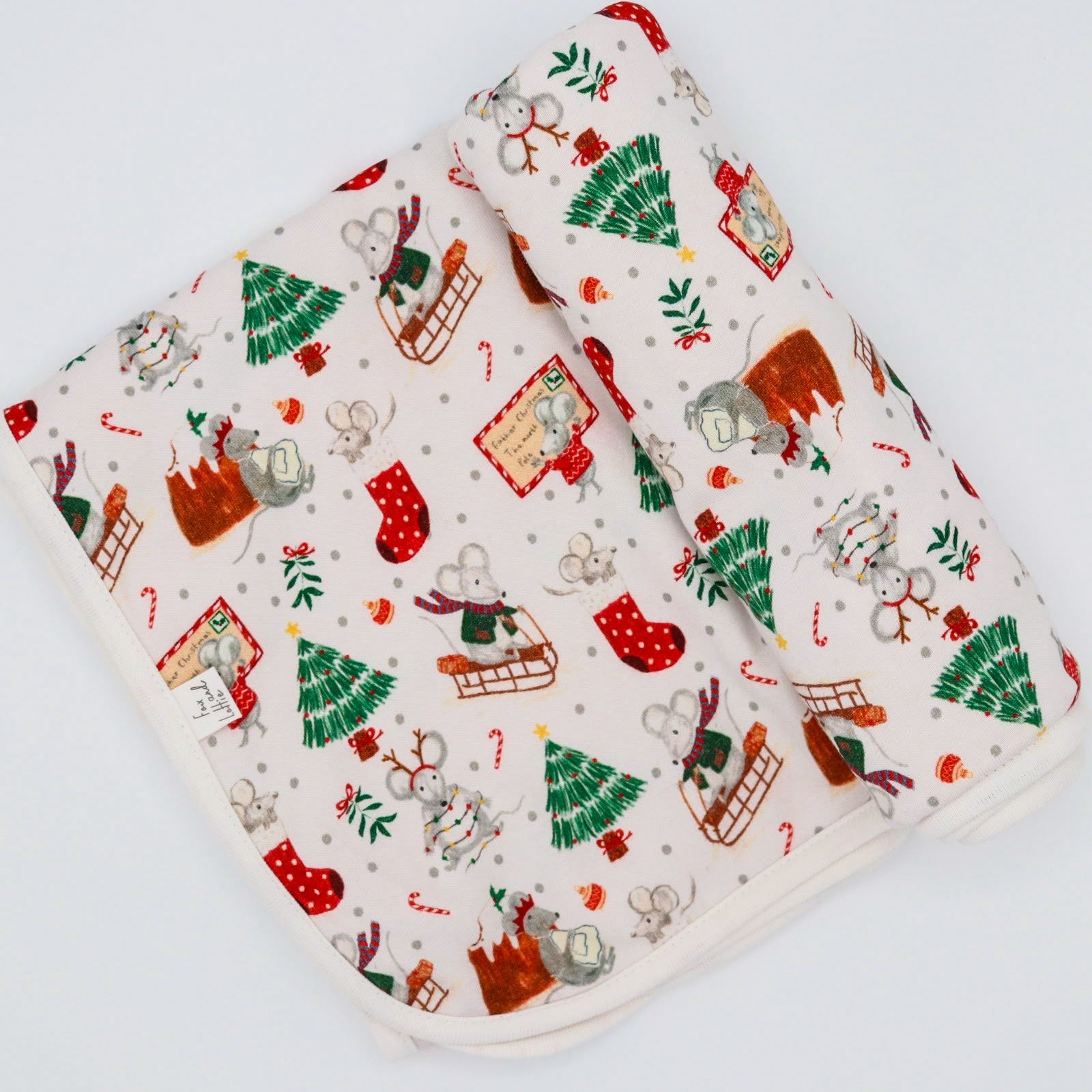 Christmas print fox and Lottie baby blanket. With mice on sleighs, mice posting Christmas card.