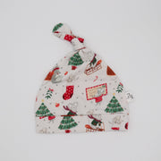Flat lay of Christmas hat from Fox and Lottie. Perfect for newborns.