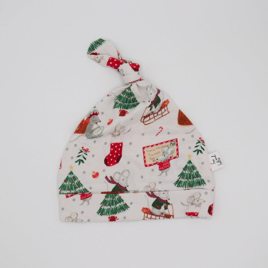 Flat lay of Christmas hat from Fox and Lottie. Perfect for newborns.