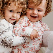 Toddler sleepwear dragon and animal print. 