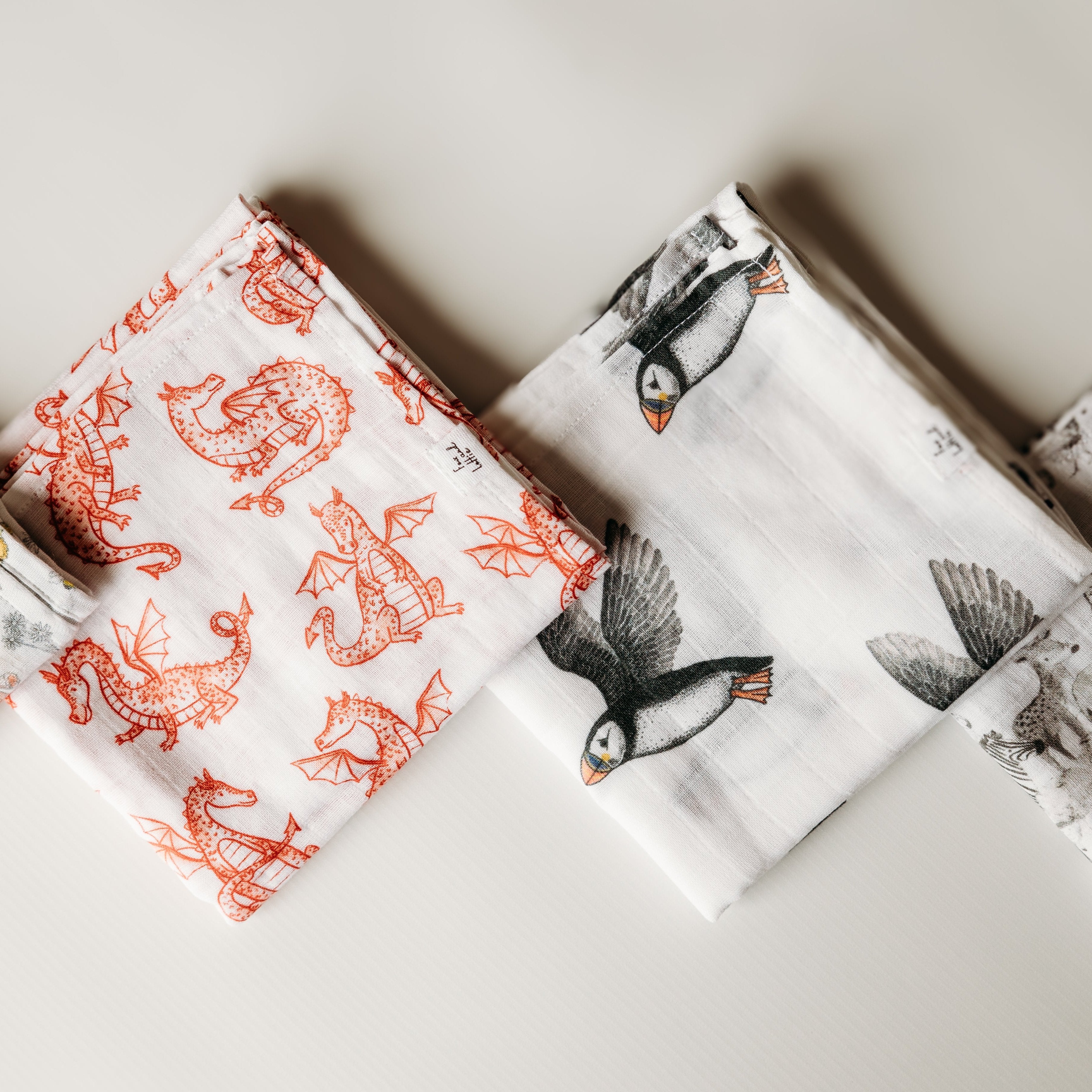 Muslin square dragon and puffin print. Fox and Lottie premium sleepwear for children and baby.